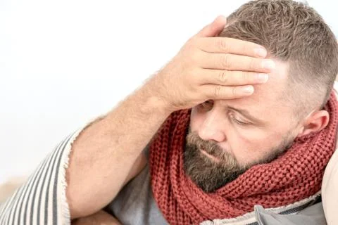 High temperature concept. Man feels badly ill. How to bring fever down. Cold  Stock Photos