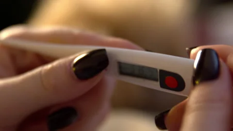 High temperature on an electronic thermometer. Close-up, 4K, slow motion Video stock 144488473
