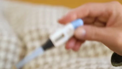 High temperature on an electronic thermometer. Close-up, 4K, slow motion Stock Footage 232920922