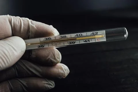 High temperature thermometer on the dark background, close up. Stock-Fotos