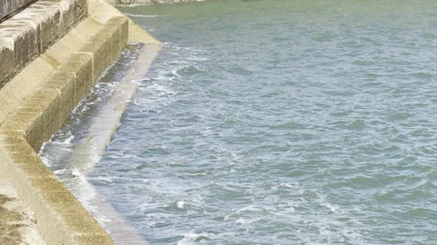 High tide flooding concrete harbor steps 4K Stock Footage 336505028