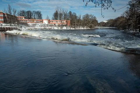 High tide in jena at saale river dam in winter 2021 at a sunny day Stock Photos