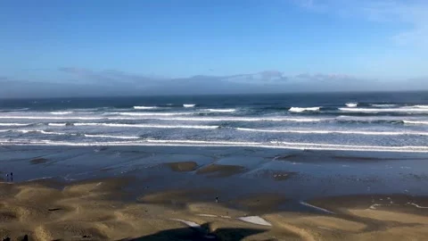 High tide with sand dunes below in Nye Beach Newport Oregon Stock Footage 143308305