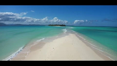 High tide on the sandbar between the islands Nosy Iranja. Madagascar.Anamorphic Stock Footage 323778808