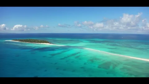 High tide on the sandbar between the islands Nosy Iranja. Madagascar.Anamorphic Stock Footage 323778930