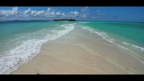 High tide on the sandbar between the islands Nosy Iranja. Madagascar.Anamorphic Stock Footage 323778982