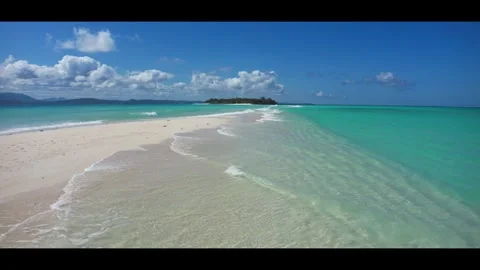 High tide on the sandbar between the islands Nosy Iranja. Madagascar.Anamorphic Stock Footage 323779344