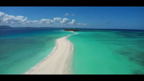 High tide on the sandbar between the islands Nosy Iranja. Madagascar.Anamorphic Stock Footage 323779716