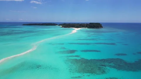 High tide on the sandbar between the islands Nosy Iranja. Madagascar Stock Footage 323780187
