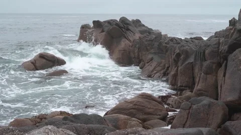 High Tide splashing Over Rocks Stock Footage 186852513