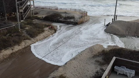 High tide threatening beach homes at Rodanthe, North Carolina Video stock 245423535