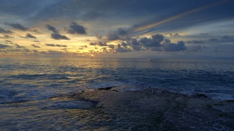 High tide waves on a tropical beach during beautiful sunset Stock Footage 115033155