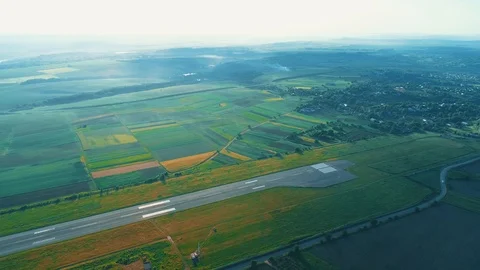 High top view of private aircraft moving along take off in countryside's runway Video stock 113080869
