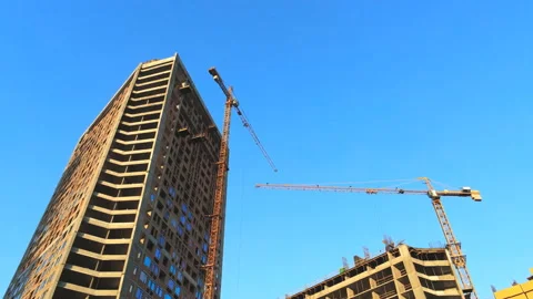 High tower building construction site. Big industrial crane. Aerial drone view Stock Footage 115798500