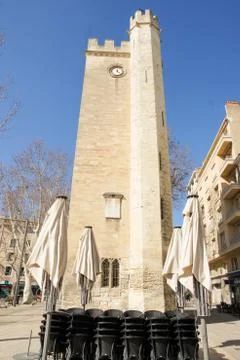 High tower with a clock. Stock Photos