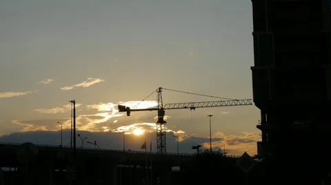 High tower crane on a construction site, timelapse Видео 52122930