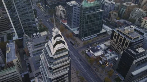 High twilight drone orbit over tiered Apoquindo tower Santiago Chile Stock Footage 334637208