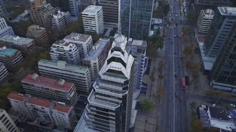 High twilight drone orbit over tiered Apoquindo tower Santiago Chile 库存影片 334637224