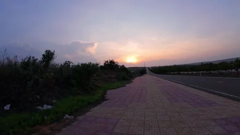 High View Action Camera POV Drive Through Bau Trang Road Stock Footage 337604614
