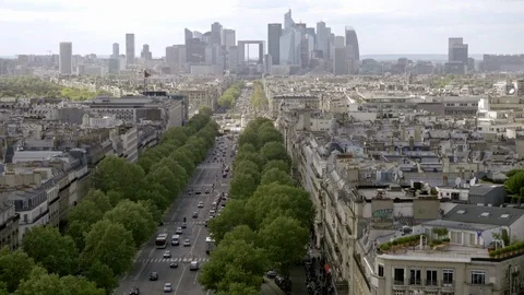High view of the city of Paris trees on street - skyscrapers - skyline - France Stock Footage 93928965