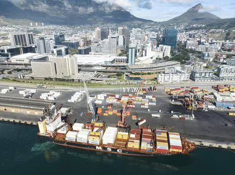 High view of container vessel packed with freight in Table Bay, Cape Town Stock Photos