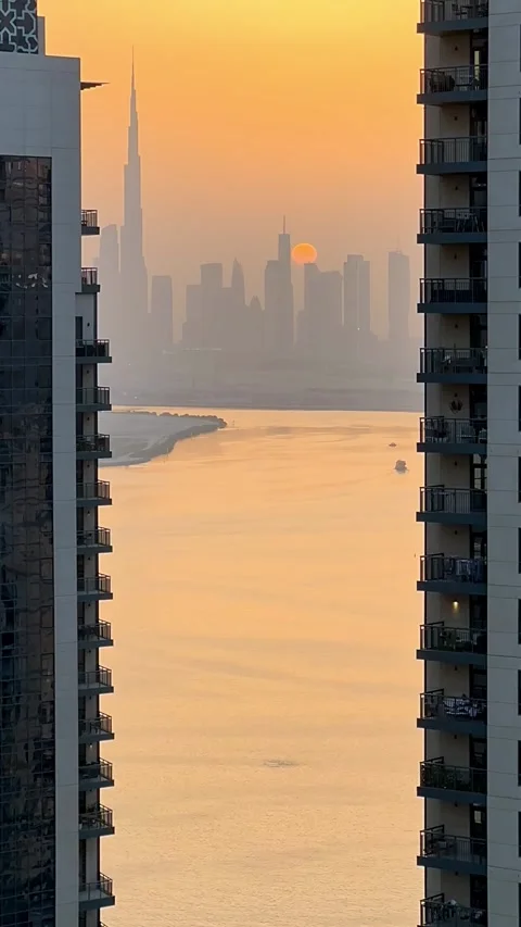 High view of Downtown Dubai with Dubai Creek canal seen through high rise Stock Footage 311201323
