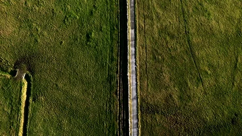 High view, Green field of grass. Wild Atlantic Irish coast. Video 4K Stock Footage 332171754