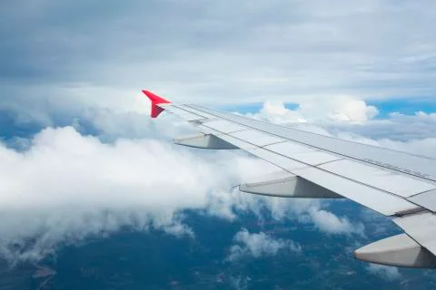 High view image through airplane window with nice clear blue sky Foto stock