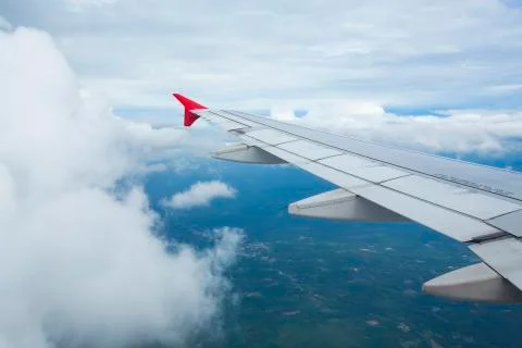 High view image through airplane window with nice clear blue sky Stock Photos