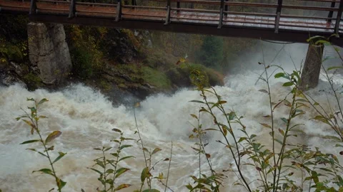 High view of a large amount of water flowing over a waterfall Stock Footage 255040085
