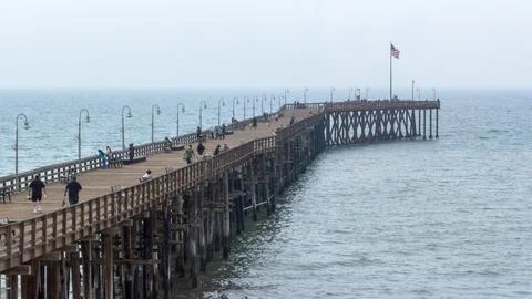 High view, looking down at side view of Ventura Pier over ocean Stock Photos