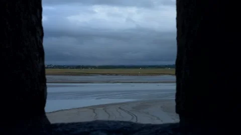 High view from medieval fort window. Bay during low tide. Video 4K 스톡 동영상 326523728