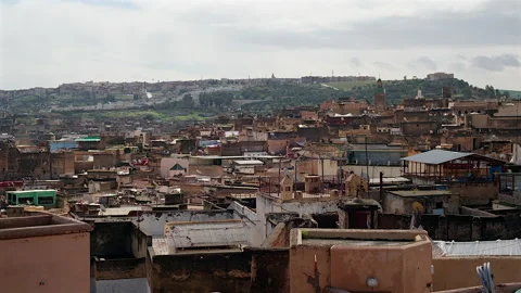 High view of the old medina rooftops and mosque tower, Fes, Morocco Stock-Footage 305638163