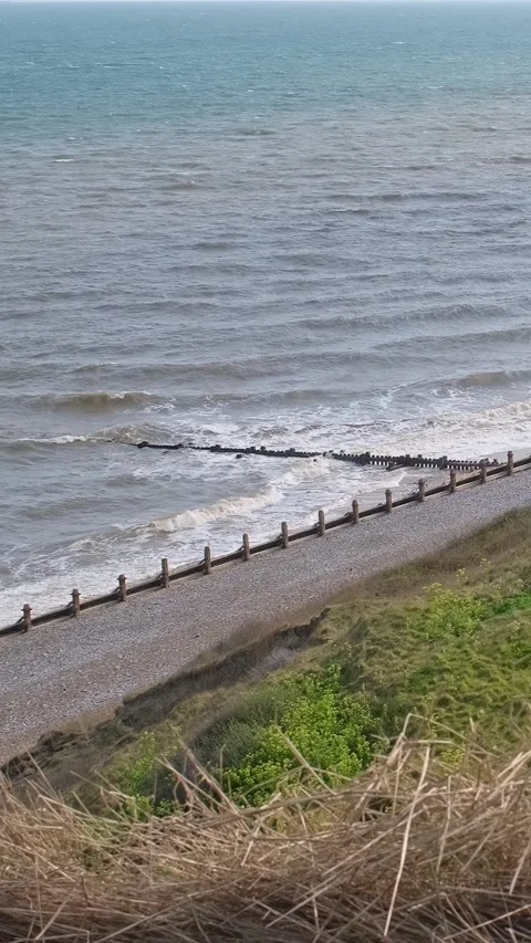 HIgh up view over Cromer beach on the North Norfolk Coast Stock Footage 307350286