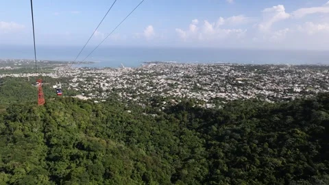 High View Passing By Cable Car Moving Down Over Tropical Puerto Plata Video stock 315193625