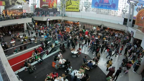 High view of people walking through a convention hall Video stock 148517846