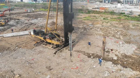 High view of pile driver rig at construction site. Stock Footage 93626159