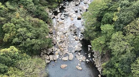 High view from river with rocks Stock Photos