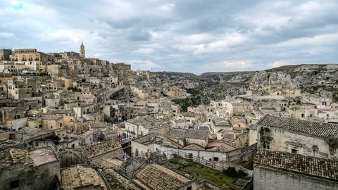 High view of town architecture skyline of matera,italy,people motion timelapse Stock Footage 125108720