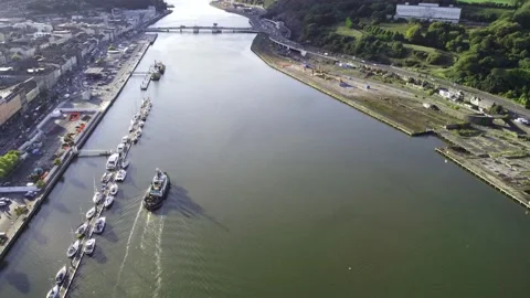High View of a Tug boat on the River Suir in the City of Waterford Stock Footage 212623817