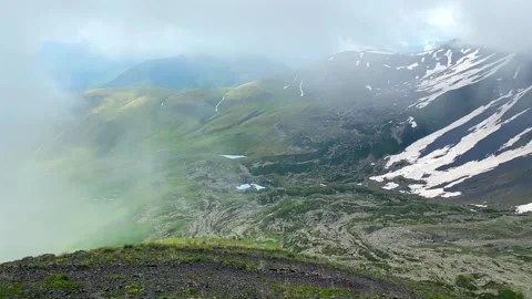 A high viewpoint reveals Green and Blue Abudelauri Lakes Stock Footage 340388946
