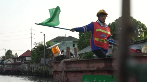 High Vis Bangkok Workers waving flag on Freight Barge Chao Phraya river Vídeo Stock 242019867