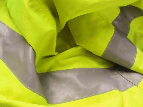High visibility yellow jacket as background Stock Photos