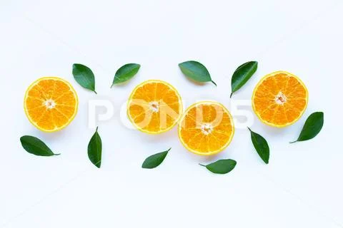 High vitamin C, Orange fruits with leaves on white background. Stock Photos
