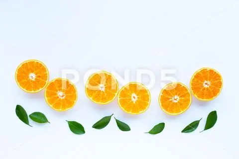 High vitamin C, Orange fruits with leaves on white background. Stock Photos