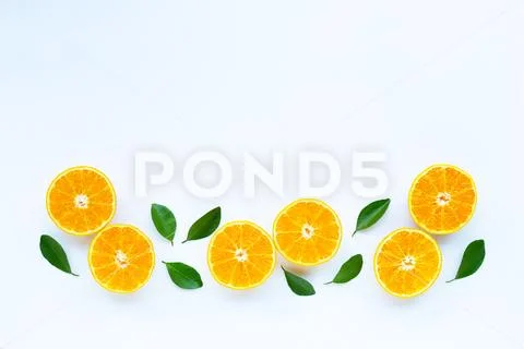High vitamin C, Orange fruits with leaves on white background. Stock Photos