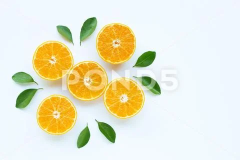 High vitamin C, Orange fruits with leaves on white background. Stock Photos
