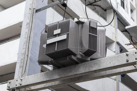 High-voltage AC transformers, transformers and high-voltage cables for powe.. Stock Photos