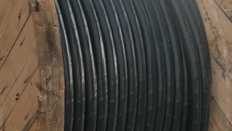 High voltage cable wound on a large reel, closeup Stock Footage 236146668