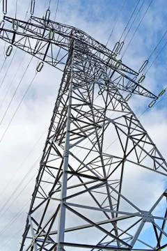High voltage cables High voltage electricity towers Stock Photos